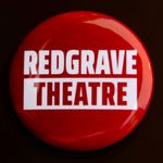 A red badge with the words Redgrave Theatre.