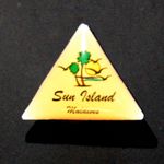 A triangle with a picture of a tree and birds and text saying Sun Island Maldives.
